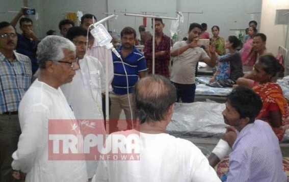 Manik Sarkar meets injured CPI-M activist at Gomati District Hospital
